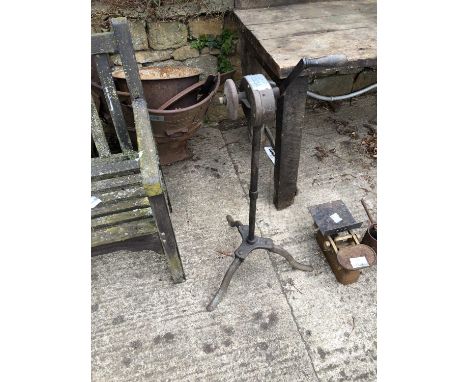 An antique grinder. 