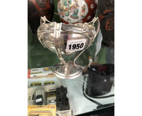 An Art Nouveau Chester silver three handled cup by Deakins