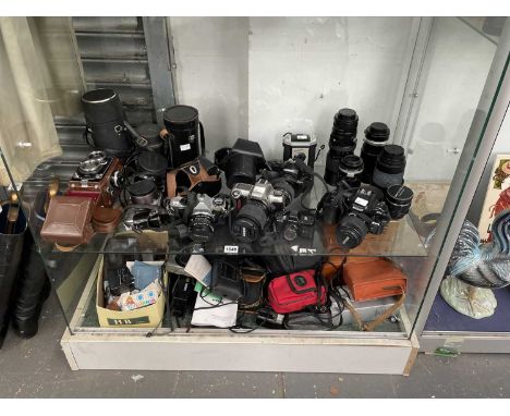 Rolleiflex, Pentax, and Nikon cameras, lenses and accessories