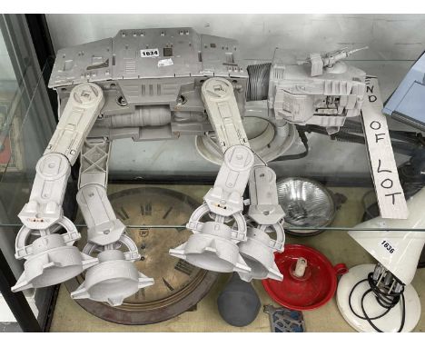 A Star Wars grey plastic At-At walker