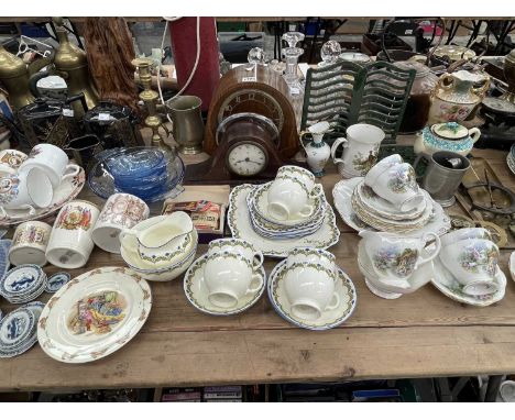 A miniature blue and white porcelain part dinner service, Tuscan and other tea wares, two clocks, a blue glass dessert set, e