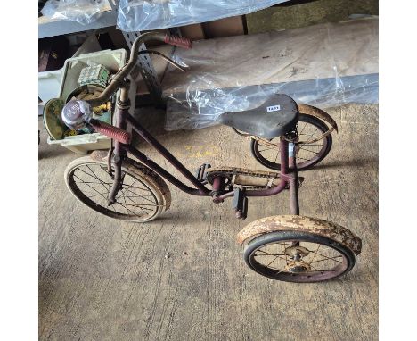 A Vintage child's tricycle, a vintage radio and a retro teasmaid.
