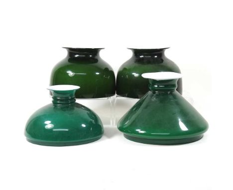 A pair of green oil lamp shades, together with two others (4)