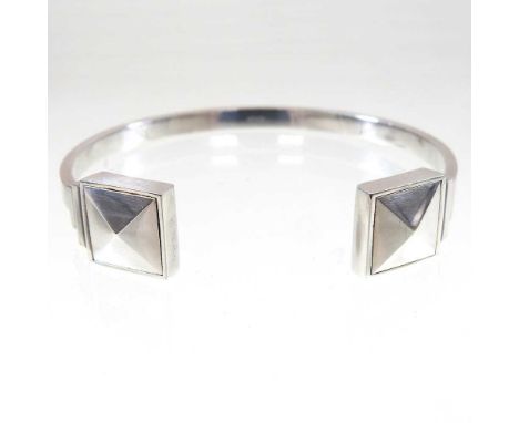 A Georg Jensen silver Nocturne bangle, by Regitze Overgaard, stamped marks and numbered 570A, 23g, 65mm wide