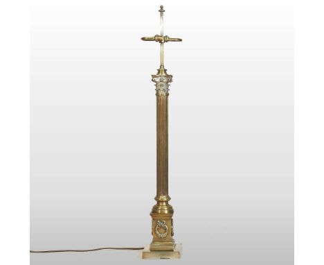 A large early 20th century brass lamp, in the form of a Corinthian column, 113cm high