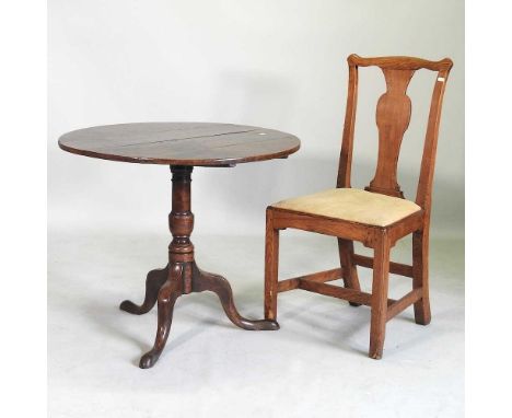 A George III oak occasional table, with a circular tilt top, on a tripod base, 80cm diameter, together with an 18th century e