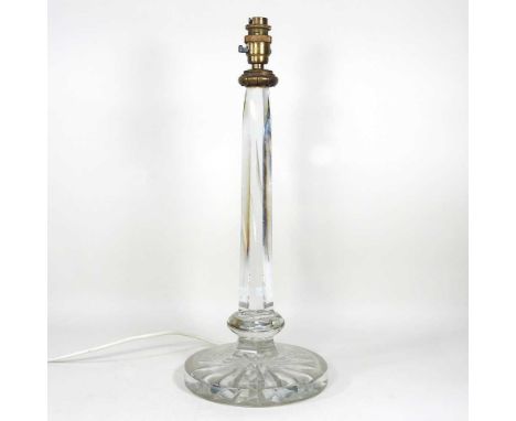 A 19th century cut crystal table lamp base, with a facetted stem and star cut base, 49cm high. According to the family this l