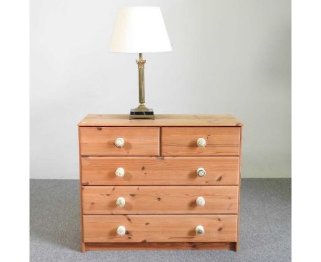 A modern pine chest of drawers, together with a table lamp and shade, in the form of a column (2)87w x 37d x 72h cm