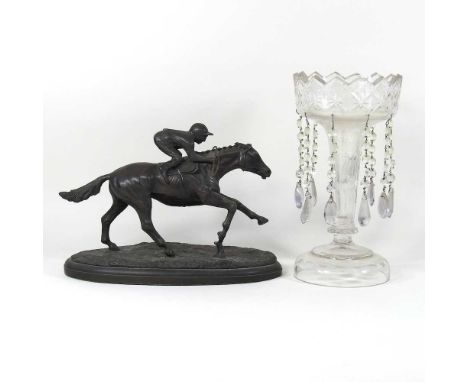 A bronzed model of a jockey, together with a Victorian glass table lustre, 32cm high (2)