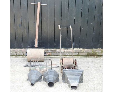 A collection of cast iron hoppers, a garden roller and a push lawn mowerThe hand mower is well worn, but appears to work corr