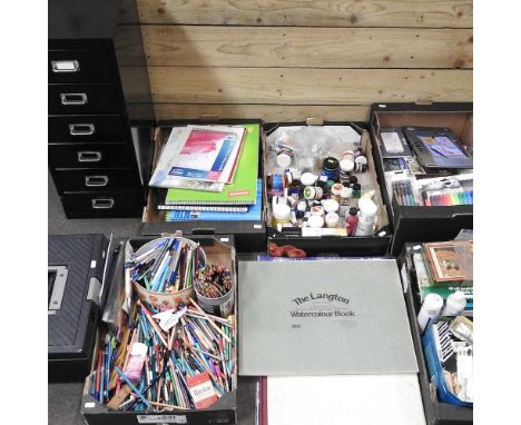A collection of art materials, to include sketch pads, paints, pencils and a metal bank of drawers, 29cm wide