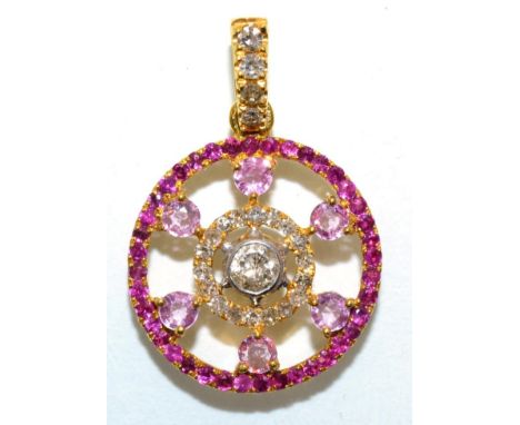 A diamond, ruby and pink sapphire pendant, a central round brilliant cut diamond in a rubbed over setting, within a pierced c