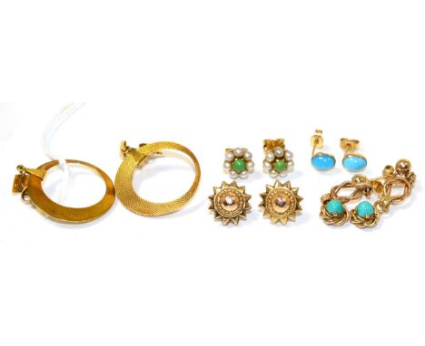 A pair of 9 carat gold hoop earrings, as engine turned disks suspended from a bail and a square stud, 3.5cm long; a pair of t