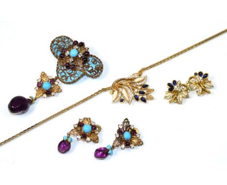 A Trifari paste and enamel necklace and earring suite, the necklace with a central cluster of leaves in cream enamel and blue