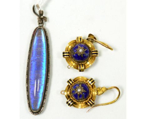 A pair of Victorian seed pearl and enamel earrings, a star set pearl within a blue enamel dome to a circular frame, with hook