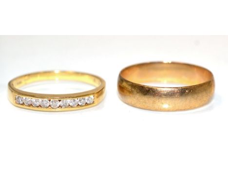 An 18 carat gold diamond half hoop ring, channel set with round brilliant cut diamonds, total estimated diamond weight 0.25 c