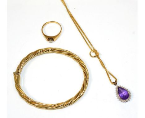 A 9 carat gold amethyst pendant, a pear cut amethyst within a beaded frame, to a 9 carat gold box link chain necklace, length