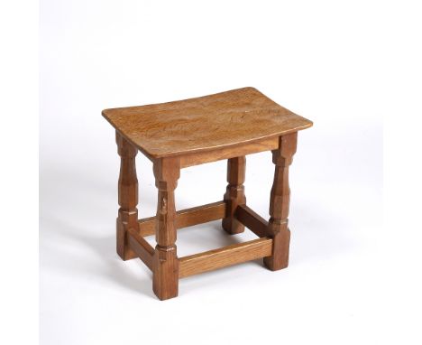 Robert 'Mouseman' Thompson Oak stool adzed rectangular top over four octagonal legs carved mouse signature 37cm high, 41cm wi