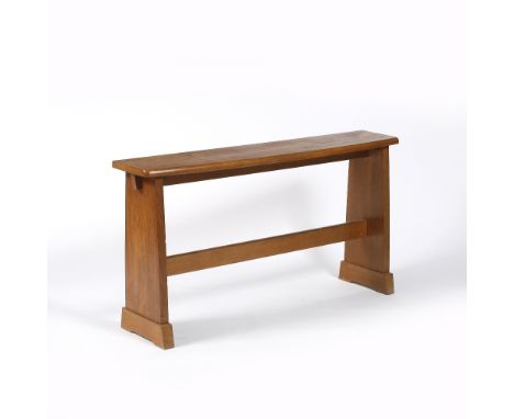 Manner of Cotswold School Oak organist bench curved front, pegged construction 68cm high, 127cm wide, 28cm deep.