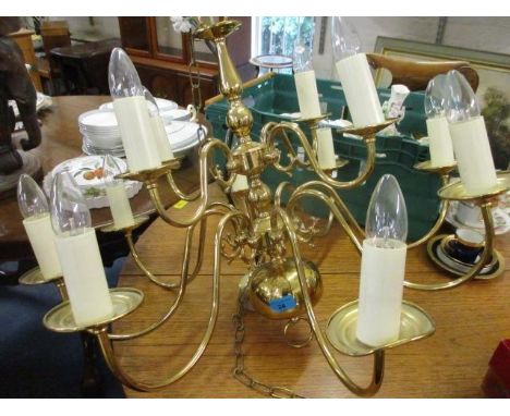 A contemporary brass twelve-branch ceiling light 