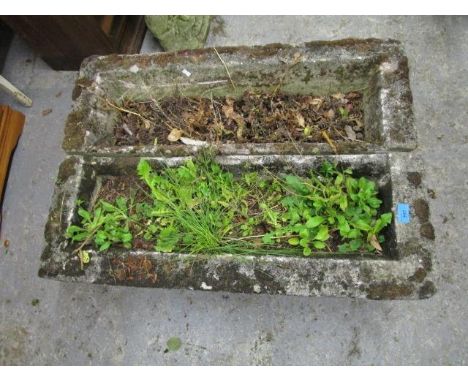 A pair of garden stoneware trough planters 