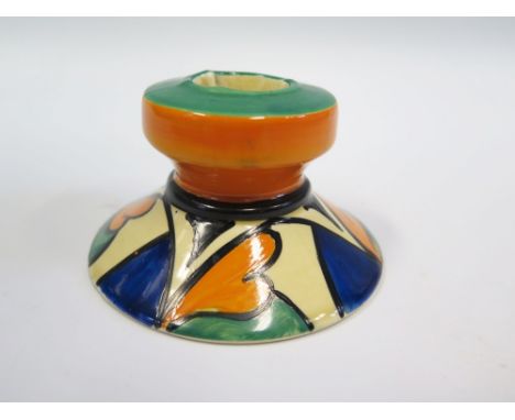 A Clarice Cliff Bizarre Candlestick decorated in bright geometric pattern with hearts, 8.5cm diam