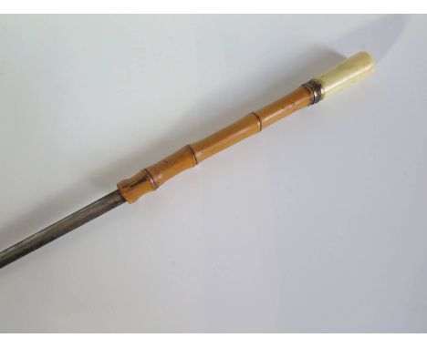 A Sword Stick with three sided blade and in bamboo cane, 101cm