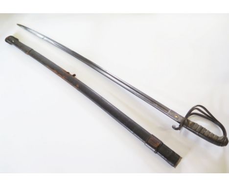 A British 1821 Pattern Sword with engraved blade and PROOF mark and leather scabbard, blade 89.5/103cm