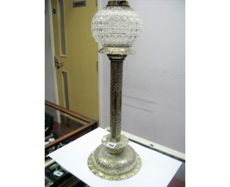 A Hukin & Heath Silver Plated Oil Lamp Base, the circular base and column with scroll leaf decoration and frilled rim, with h