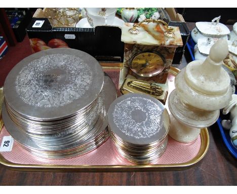 A Quantity of Plated Coasters, Azizoff mantel clock, Ronson lighter, alabaster jar and cover:- One Tray 