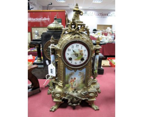 A Late XIX Century French Brass Cased Eight Day Mantel Clock, with enamel dial, Arabic numerals, domed case with flanking sup