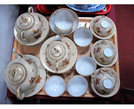 An Early XX Century Japanese Tea Service, with butterflies and gilt criss-cross decoration, (forty-two pieces), etc:- One Tra