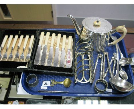 A Late XIX Century Plated and Engraved Teapot, XIX Century plated ladle, cased fish knives and forks, nut crackers, toast rac