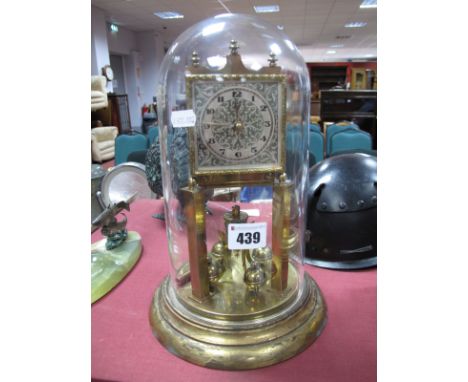 A Brass Skeleton Mantel Clock, stamped 20702 to back plate, on circular base, under dome.