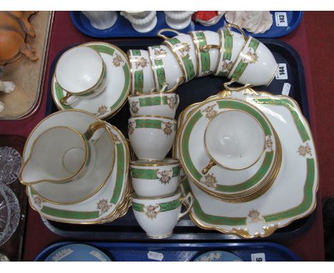 A Standard China Circa 1920's Tea Service, of thirty-nine pieces, with gilt highlights to green bands:- One Tray