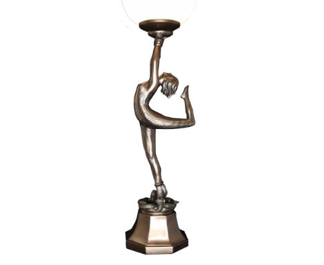 A Lady Lamp with glass shade in bronzed coloured composite material. H: 65cm  W: 16cm  D: 16cm