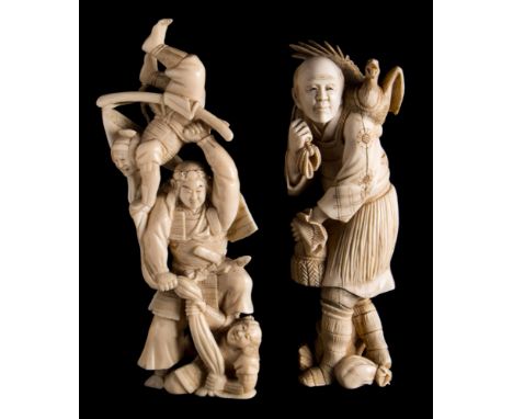 Two Japanese carved ivory okimonos: the first in the form of a group of three acrobats with one held aloft by the main standi