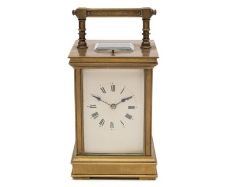 A Victorian brass carriage clock: the eight-day duration movement having a platform lever escapement and striking the hours a