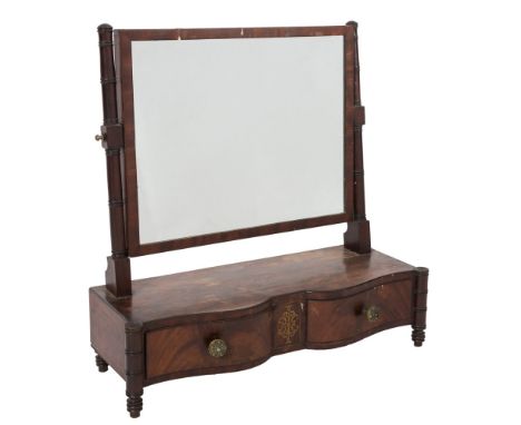 A Regency mahogany and inlaid serpentine fronted platform toilet mirror:, bordered with ebonised lines, having a rectangular 