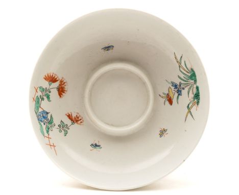 A Chantilly trembleuse saucer: painted in the Kakiemmon palette with two floral sprays and scattered insects, hunting horn ma