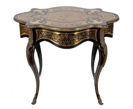 A 19th Century French ebonised cut brass marquetry and gilt metal mounted occasional table in the manner of Andre Charles Buh