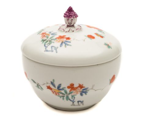 A Meissen sucrier and cover: with flower bud finial, painted in the Kakiemon palette with floral sprays, underglaze blue Marc