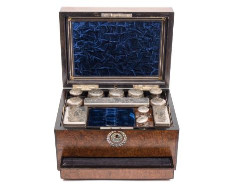 A 19th century figured rosewood and mother-of-pearl inlaid vanity box: of rectangular outline, the hinged lid with inset mirr