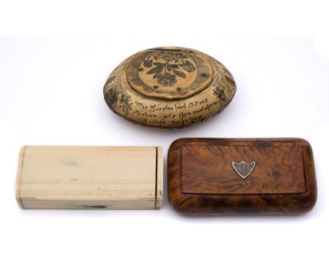 A 19th century Dutch horn snuff box: of oval outline with penwork decoration, 8cm. wide, a rectangular bone snuff box and a t