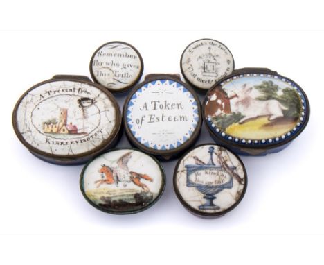 A collection of seven South Staffordshire enamel patch boxes: decorated with various mottos and scenes, including oval and ci