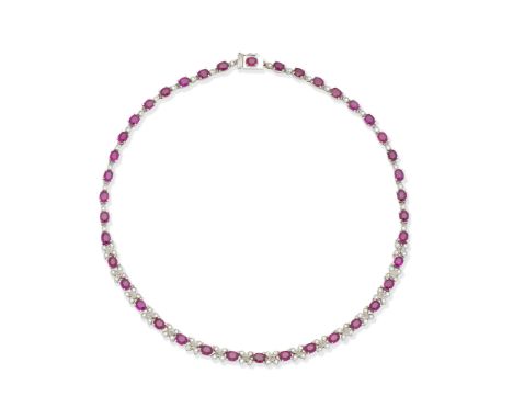 Ruby and diamond necklaceAlternately-set with oval-cut rubies and brilliant-cut diamonds, length 39.9cmFor further informatio