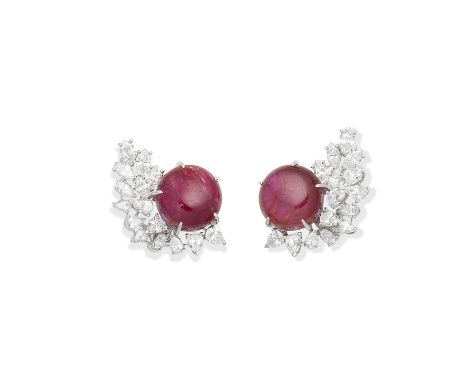 Ruby and diamond earclipsEach circular ruby cabochon within a partial surround of pear-shaped and marquise-cut diamonds, diam