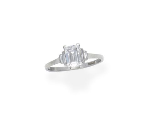 Diamond ringThe step-cut diamond between tiered baguette-cut diamond shoulders, principal diamond approx. 1.25cts, ring size 