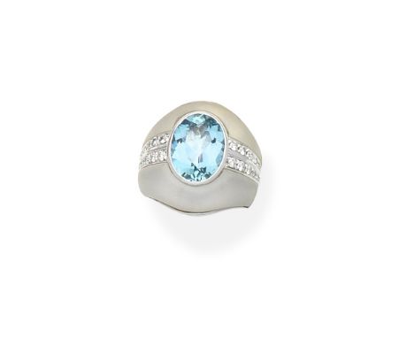 Aquamarine, rock Crystal and diamond ringThe oval-cut aquamarine, between bombé rock crystal plaques, accented by rows of bri