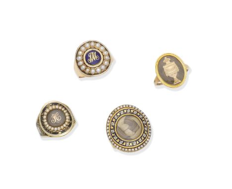 Four mourning rings, late 18th century - circa 18011st: The gilt funeral urn on a plaited hair ground, the reverse engraved, 